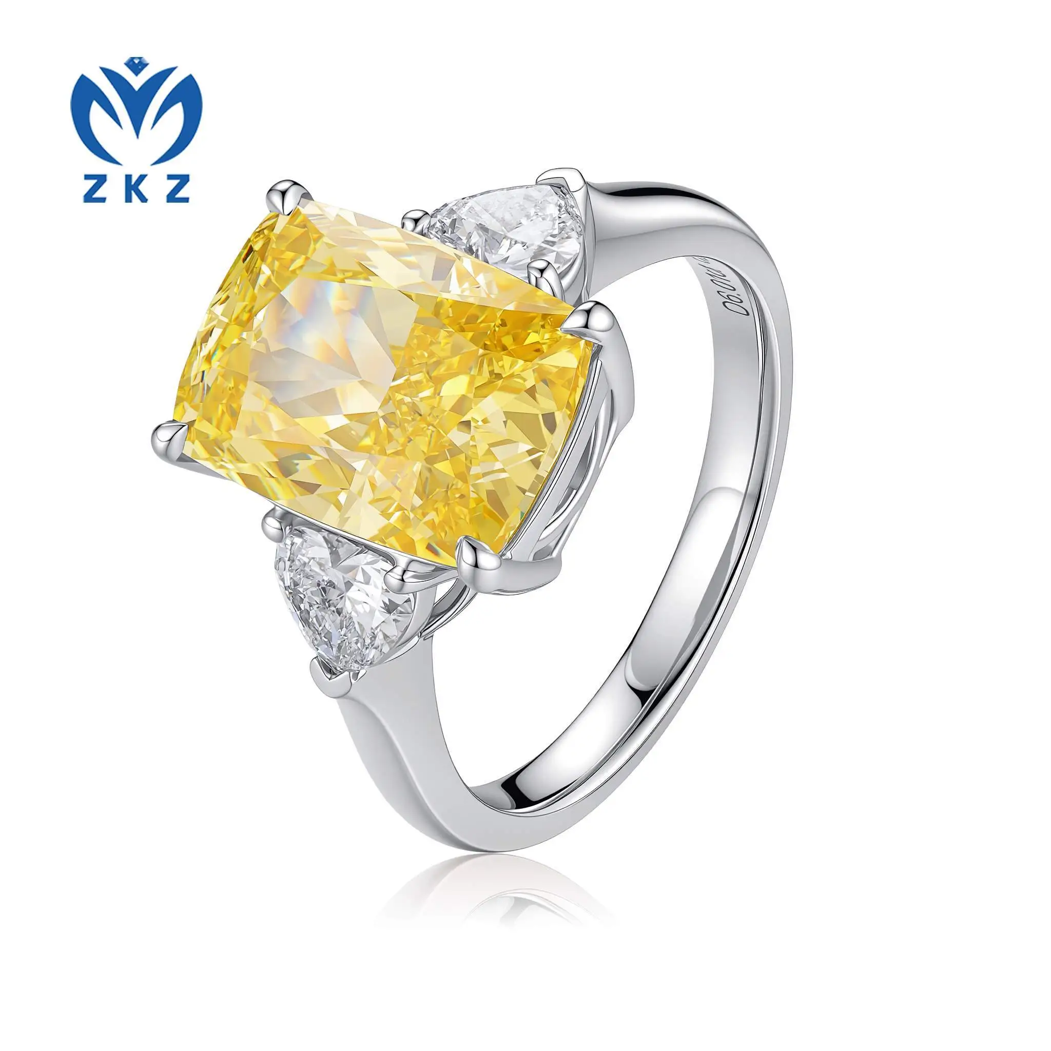 6.01ct VS2 IGI-certified long pillow-shaped laboratory-grown yellow diamond ring with three-stone setting and a heart-shaped white diamond accent stone. US size 6.75, ZKHZ024 1