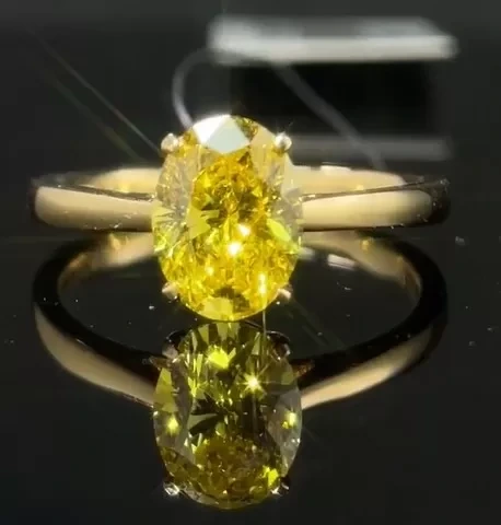خاتم ألماس بيضاوي الشكل من مجوهرات مختبرية بوزن 1.59 قيراط، أصفر زاهي، بتصميم كلاسيكي فاخر 1