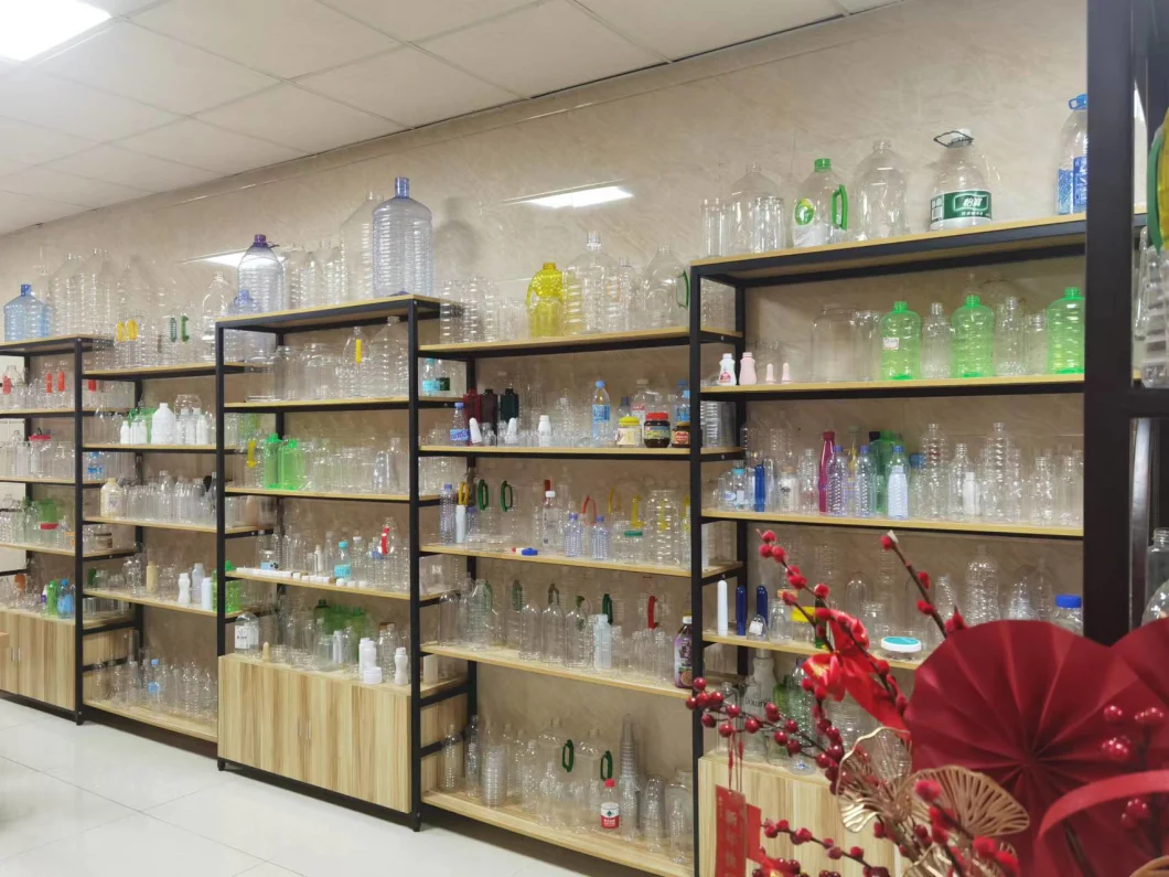 Pure Minural Water Liquid Bottle Rotary Capsule Bottling Automatic Filling Filler Packing Machine Equipment Price Manufactures China