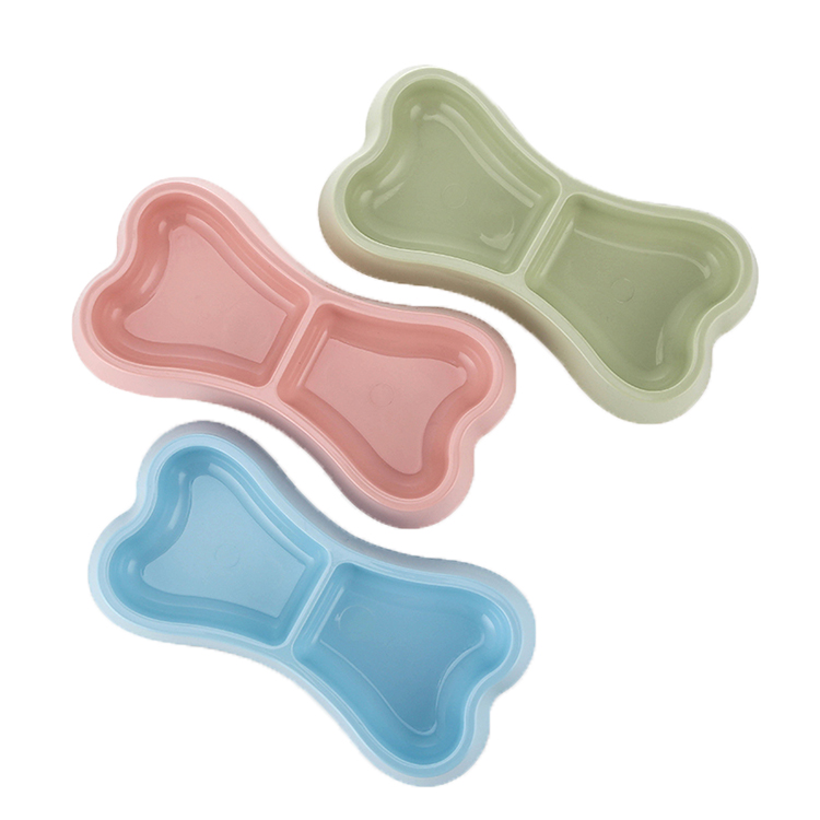 ROADREIGN - Proveedor chino de productos para mascotas. Cuenco doble de plástico con forma de hueso para perros. 1