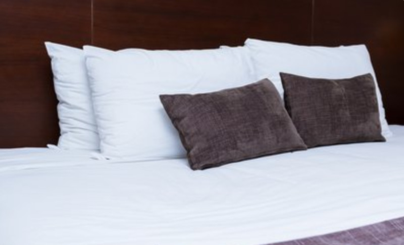 Why do hotels usually put 4 pillows in guest room? 1