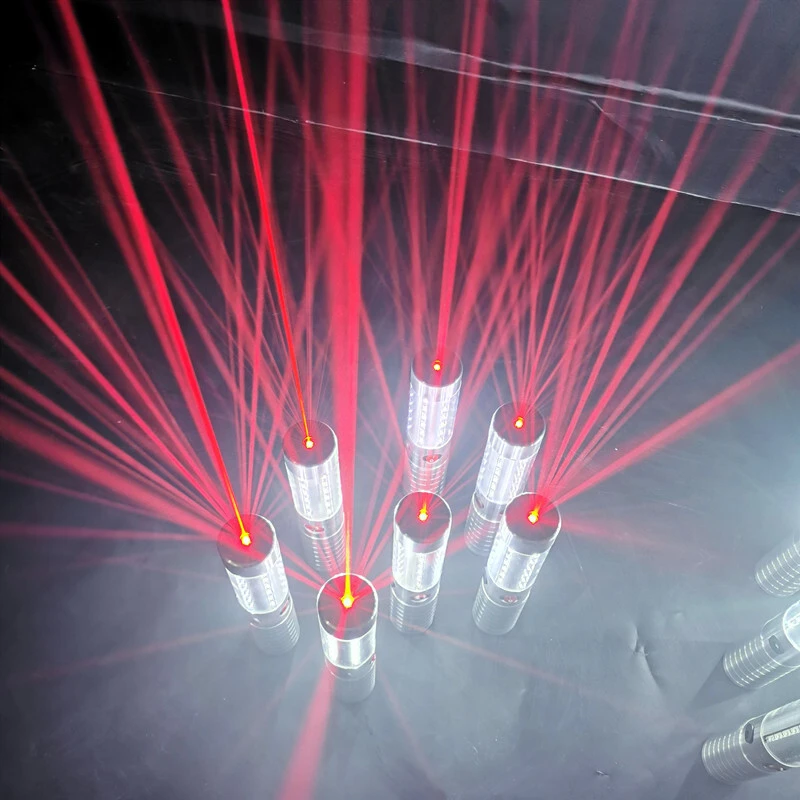 Class 2 laser bottle sparklers projecting red beams for VIP bottle service display