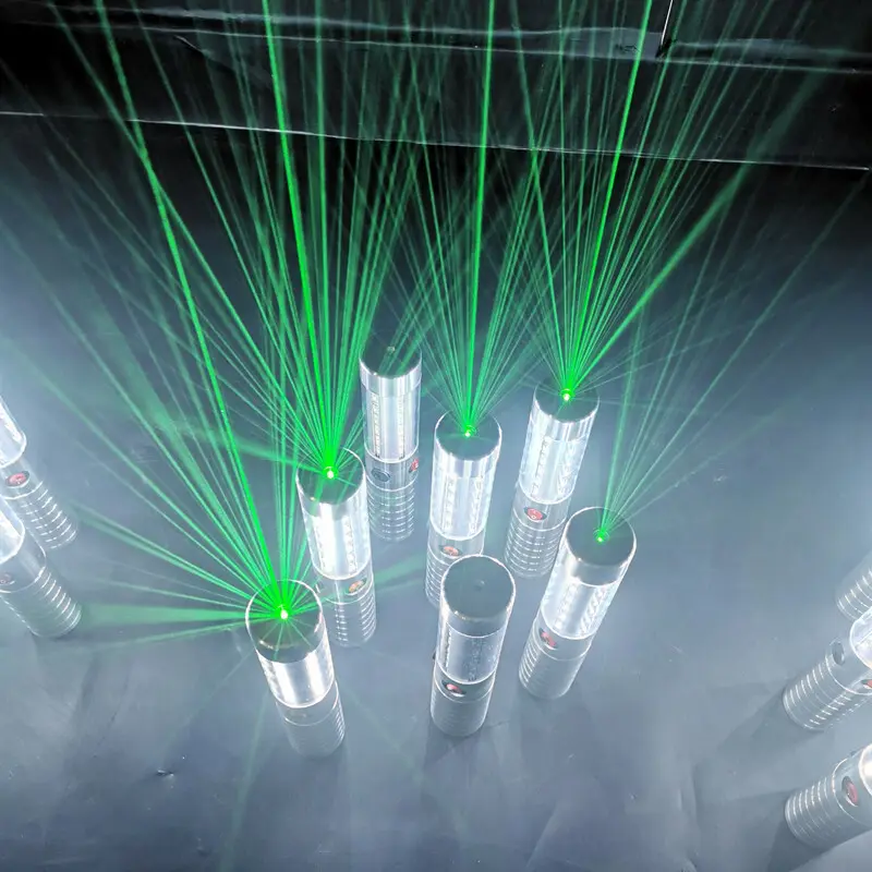 Rechargeable LED bottle sparklers with green laser beams in nightclub table presentation