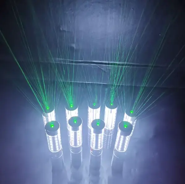 Multiple Class 2 laser bottle sparklers showing green beam effect on dark background
