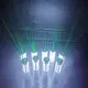 Multiple Class 2 laser bottle sparklers showing green beam effect on dark background