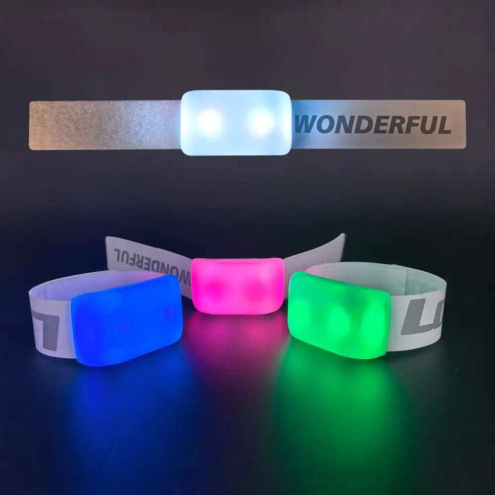 Custom branded elastic LED wristbands with vibrant dual-LED illumination for concerts