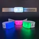 Custom branded elastic LED wristbands with vibrant dual-LED illumination for concerts