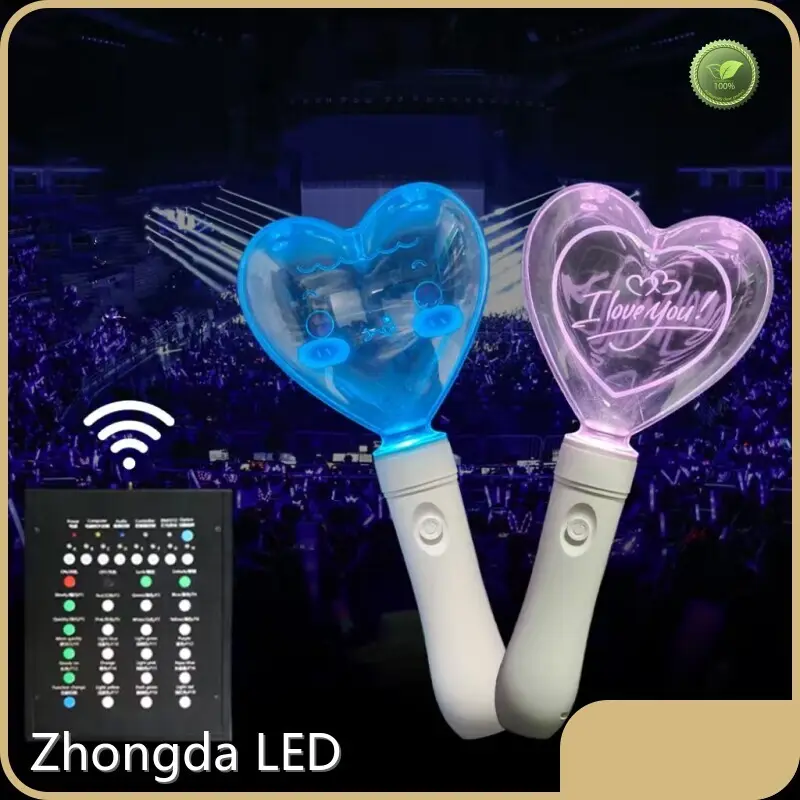 Handheld heart-shaped Kpop light stick demonstrating 15 selectable LED colors via manual button control.