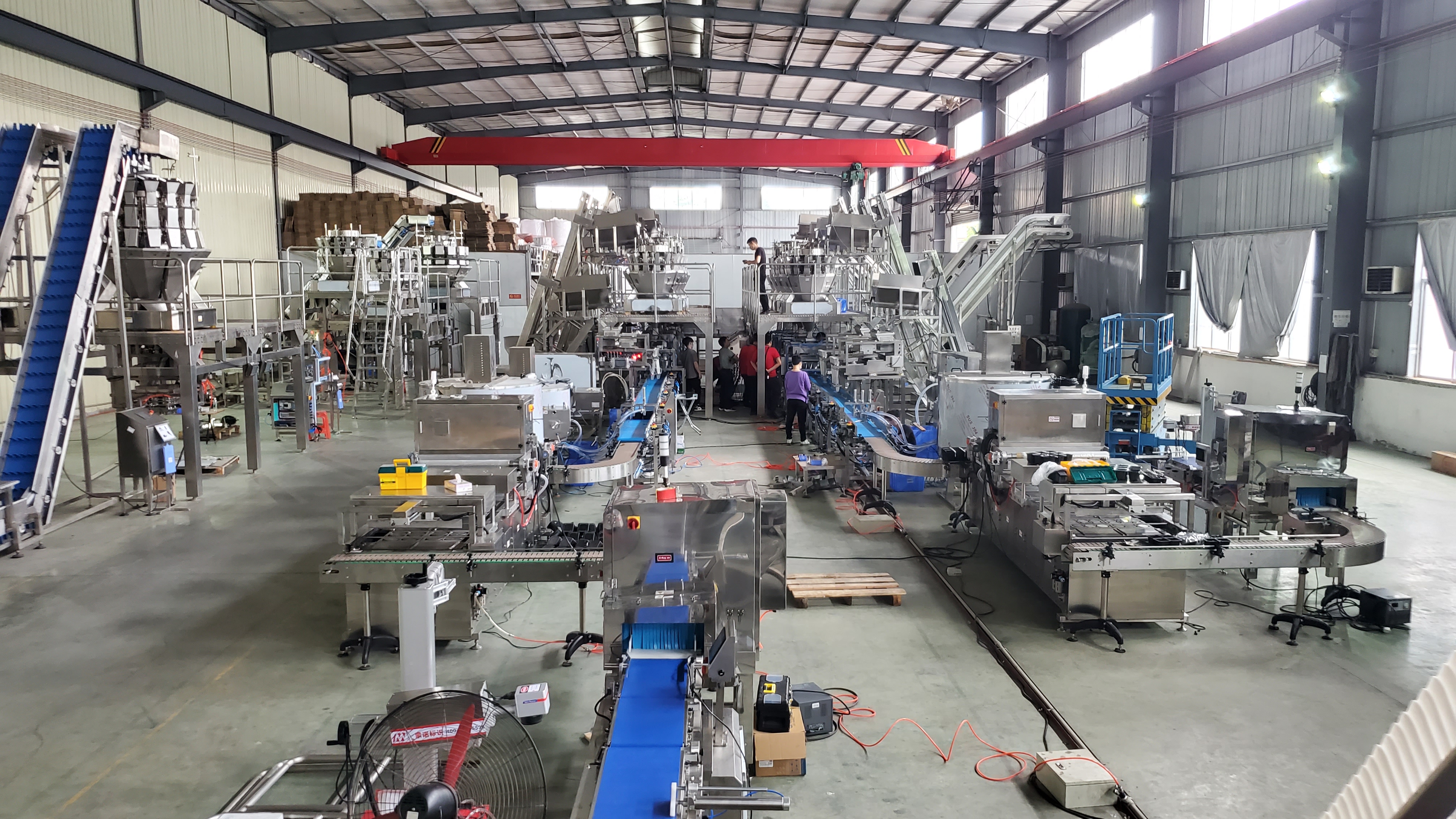 What are the functions of the crayfish tray filling and packing system? 13