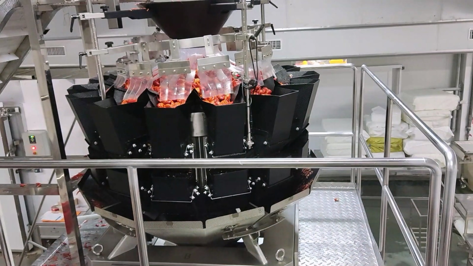 What are the functions of the crayfish tray filling and packing system? 6