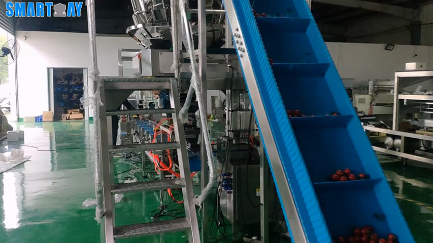  Balicí stroj do véčkových tvarů