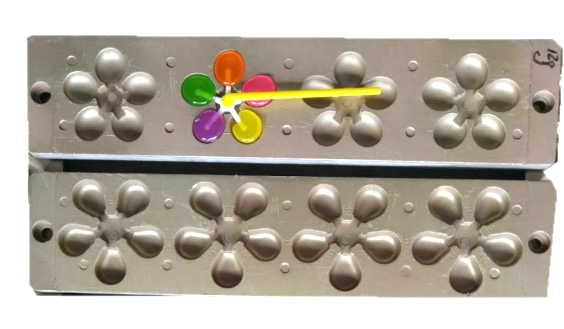 Windmill lollipop depositing line 1