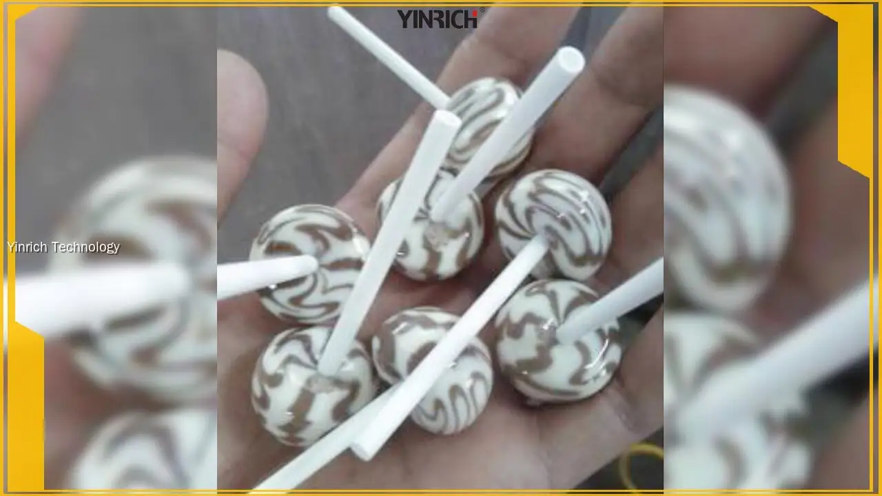 Línia automatitzada de dipòsit de piruletes amb sistema d'inserció de pals: alta capacitat i precisió 1