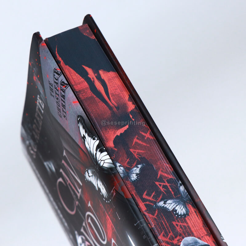 6*9 Hardcover-Buch inklusive Farbschnitt und Schutzumschlag mit Folienprägung 10