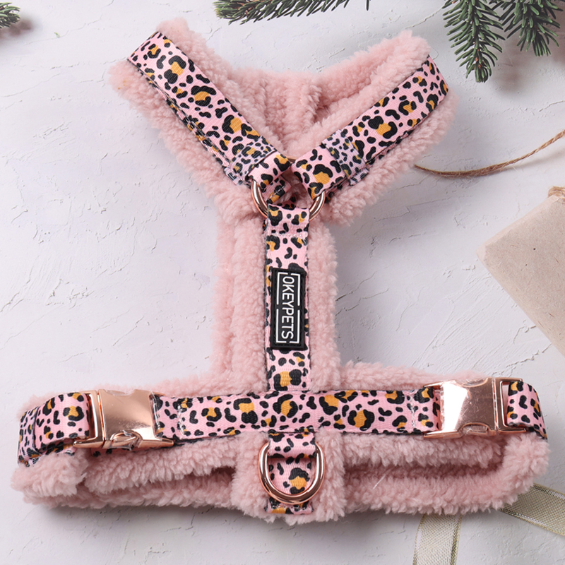 Pink sherpa fleece dog harness designed for warm and comfortable winter walks