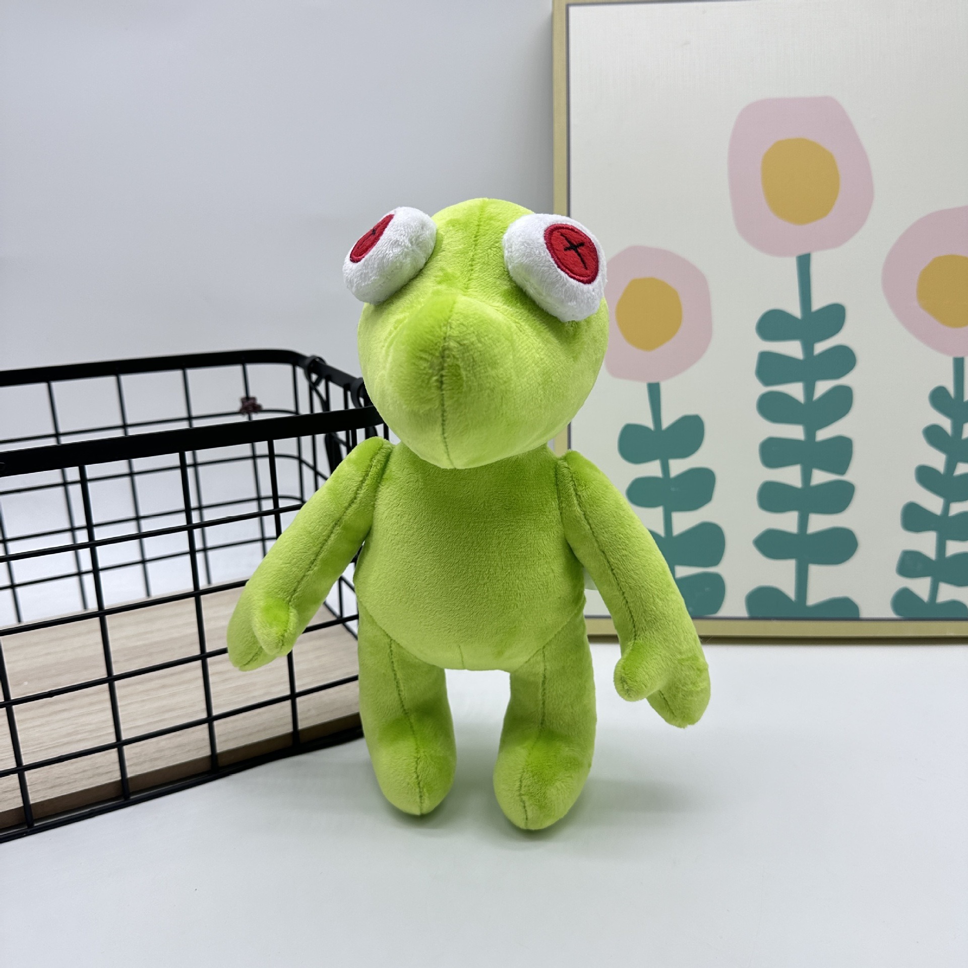 Peluche Petite Grenouille Verte Vibrante Runmo - Poupée en Peluche de 26 cm avec des yeux en croix rouge 11
