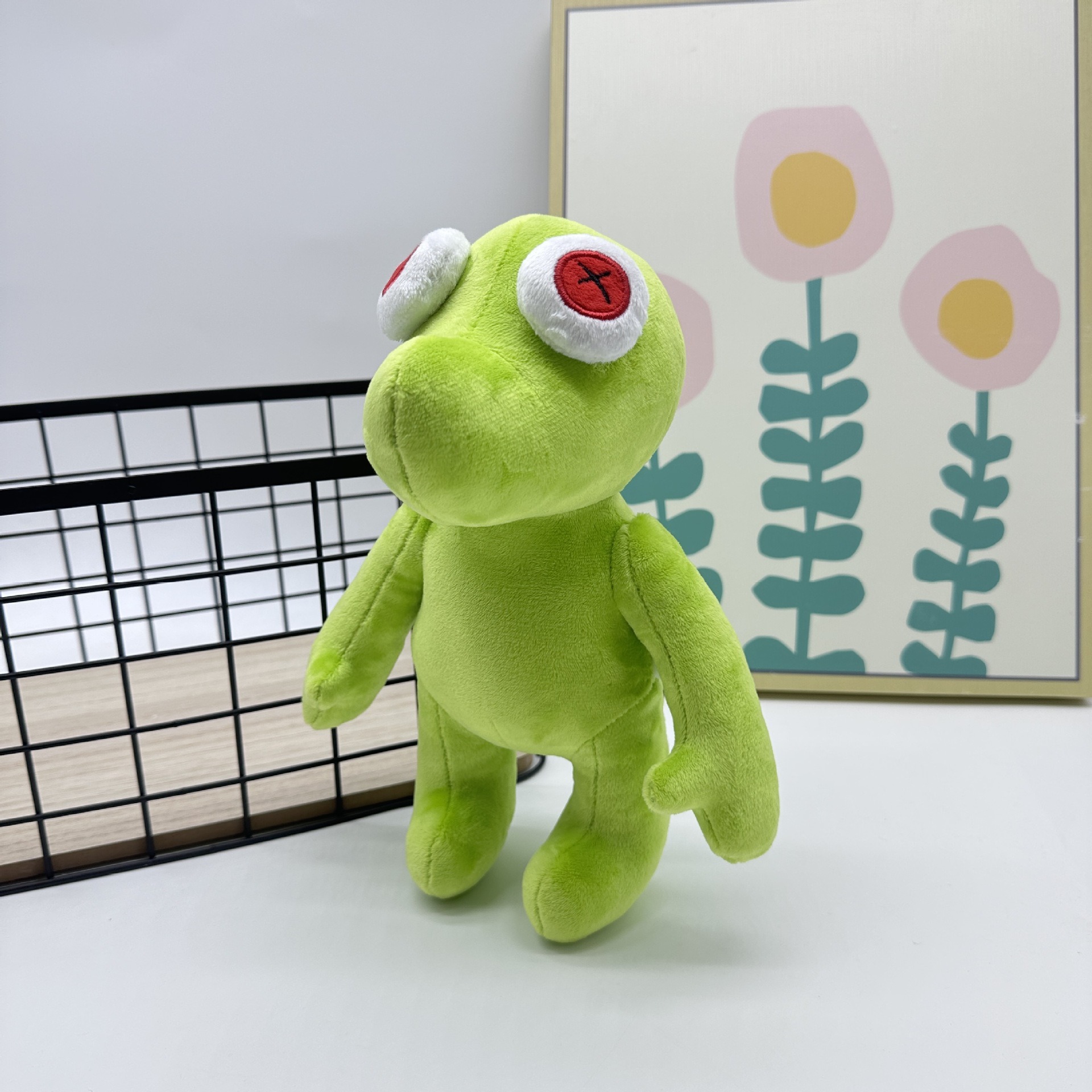 Peluche Petite Grenouille Verte Vibrante Runmo - Poupée en Peluche de 26 cm avec des yeux en croix rouge 16