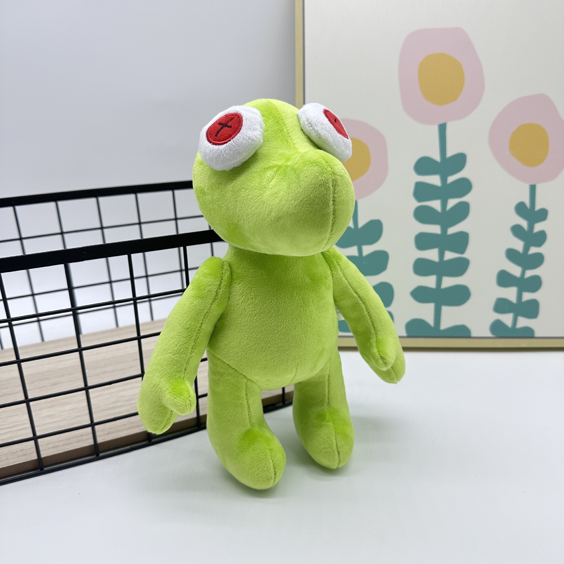 Peluche Petite Grenouille Verte Vibrante Runmo - Poupée en Peluche de 26 cm avec des yeux en croix rouge 14