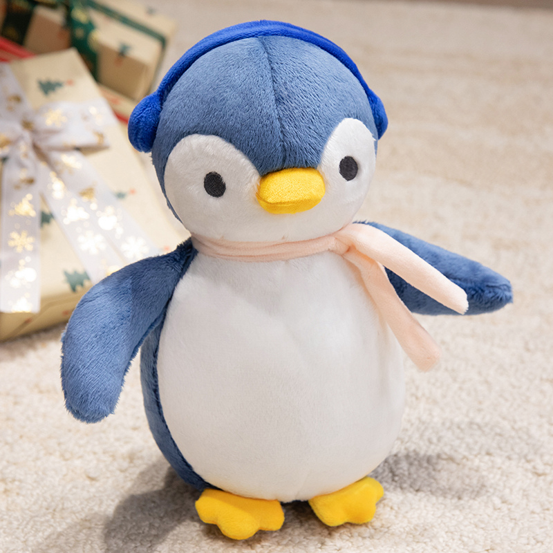 A plush doll in the unique shape of a penguin wearing headphones, a gift for children 12