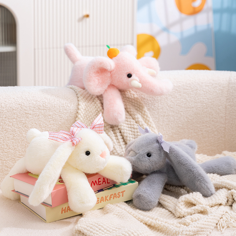 Des peluches d'animaux à position couchée sur le ventre, douces et confortables, un cadeau pour tenir compagnie aux enfants. 11