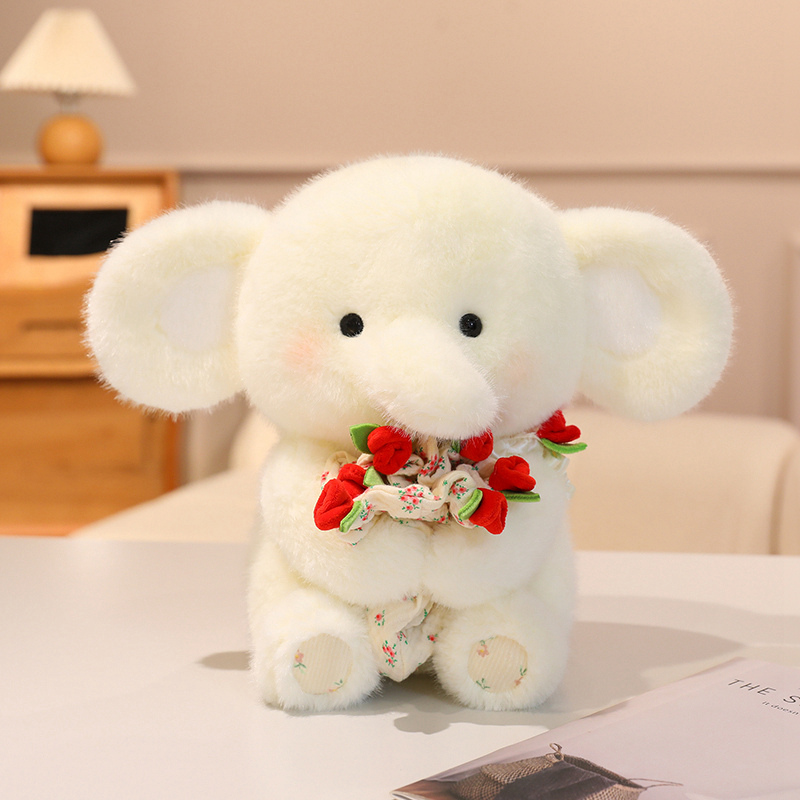 Lindo elefante de peluche con flor - Adorable animal de peluche 12