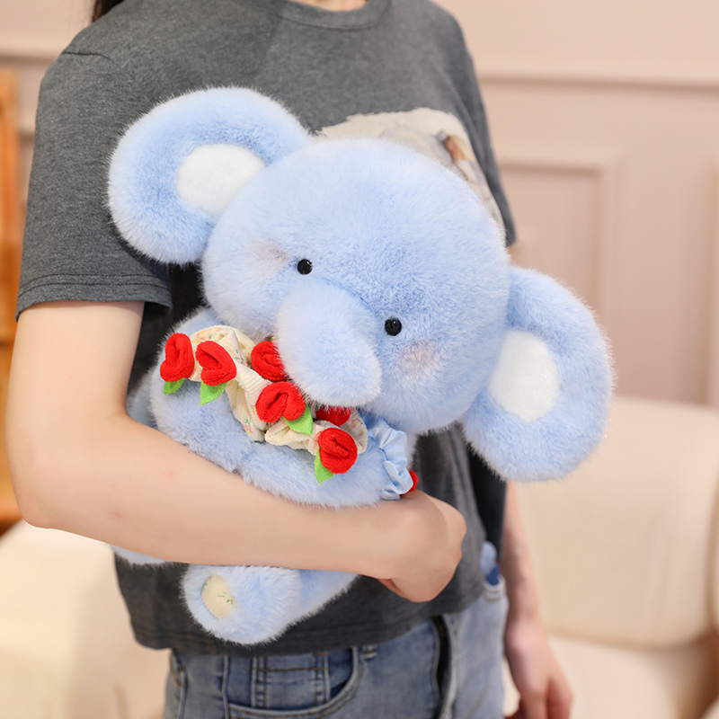 Lindo elefante de peluche con flor - Adorable animal de peluche 22