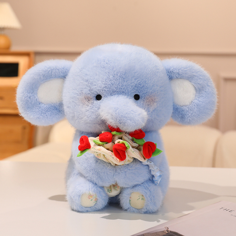 Lindo elefante de peluche con flor - Adorable animal de peluche 13