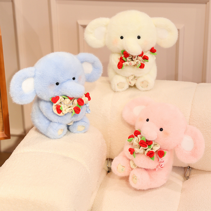 Lindo elefante de peluche con flor - Adorable animal de peluche 18