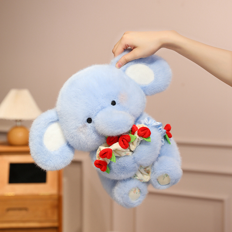 Lindo elefante de peluche con flor - Adorable animal de peluche 24