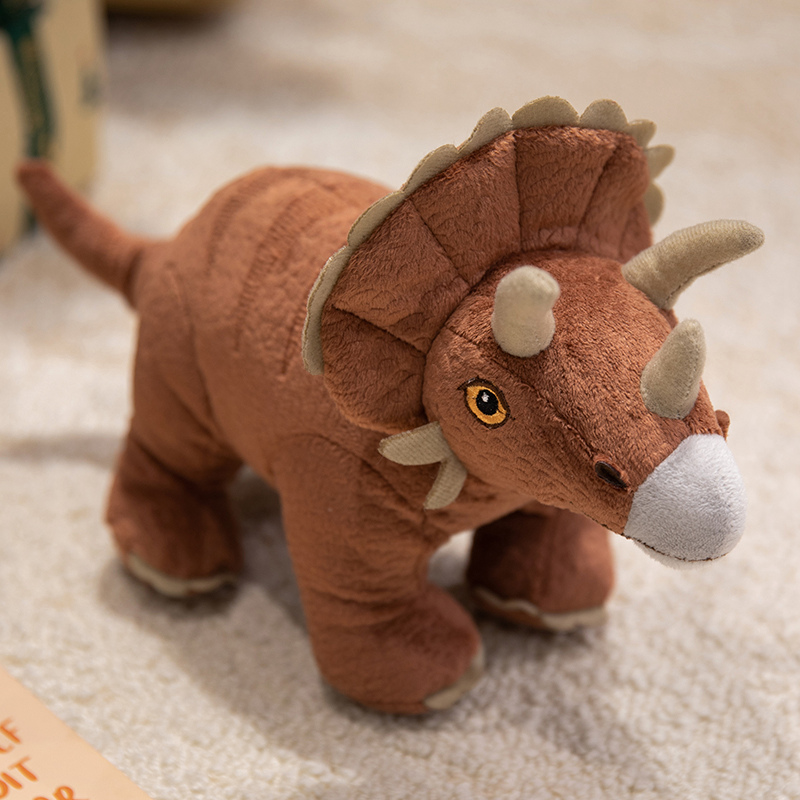 Diseños creativos de múltiples muñecos de peluche con forma de dinosaurio, que son regalos educativos y agradables para los niños. 16