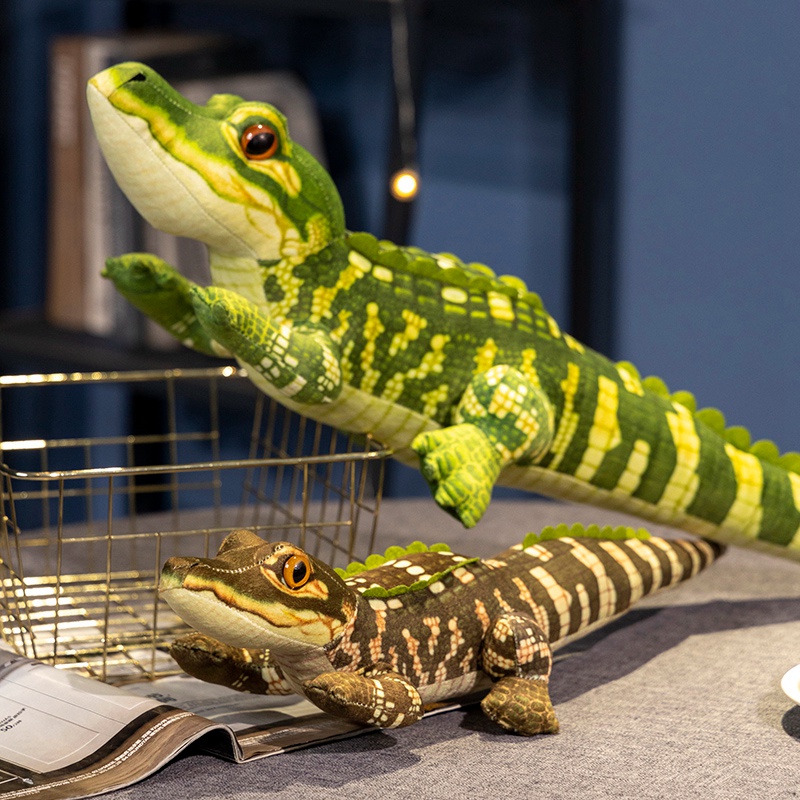 Peluche crocodile au design créatif et à la forme adorable, un compagnon chaleureux pour les enfants, un cadeau idéal et un bel objet de décoration. 14