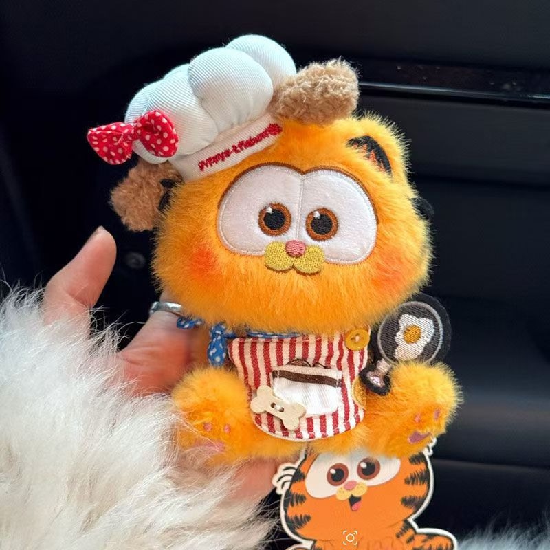 2025 Vente en gros 10 cm Nouveau pendentif de sac à main populaire Garfield, le chat chef cuisinier, porte-clés mignon 12