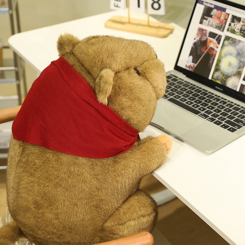 Stuffed groundhog plush toy with headscarf, creatively designed as a fun companion gift for children 16