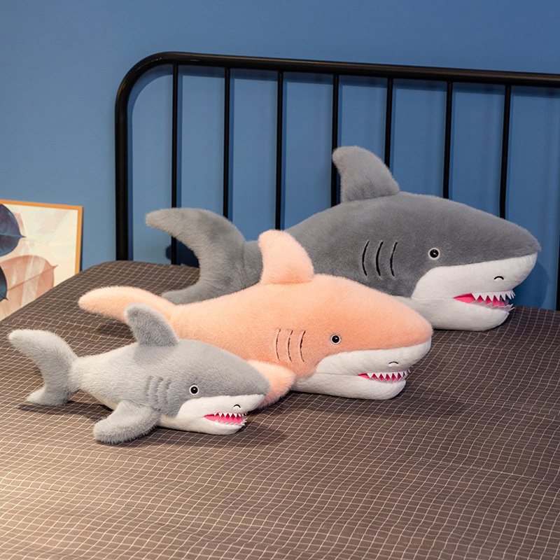 Shark plush toys available in two colors, featuring plush toys with sharp teeth and plush pillows that are soft 12