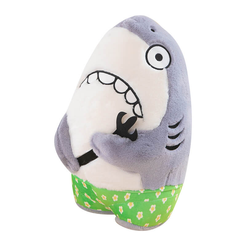 Petit requin en peluche rigolo avec fourchette, à petit prix de gros, idéal pour une fête d'anniversaire ou comme cadeau amusant. 17