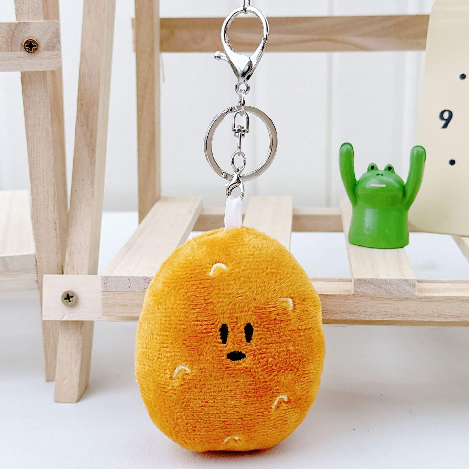 Venta al por mayor de 9 cm de patata de peluche pequeño colgante lindo llavero de peluche kawaii fabricante de peluche fabricación 16