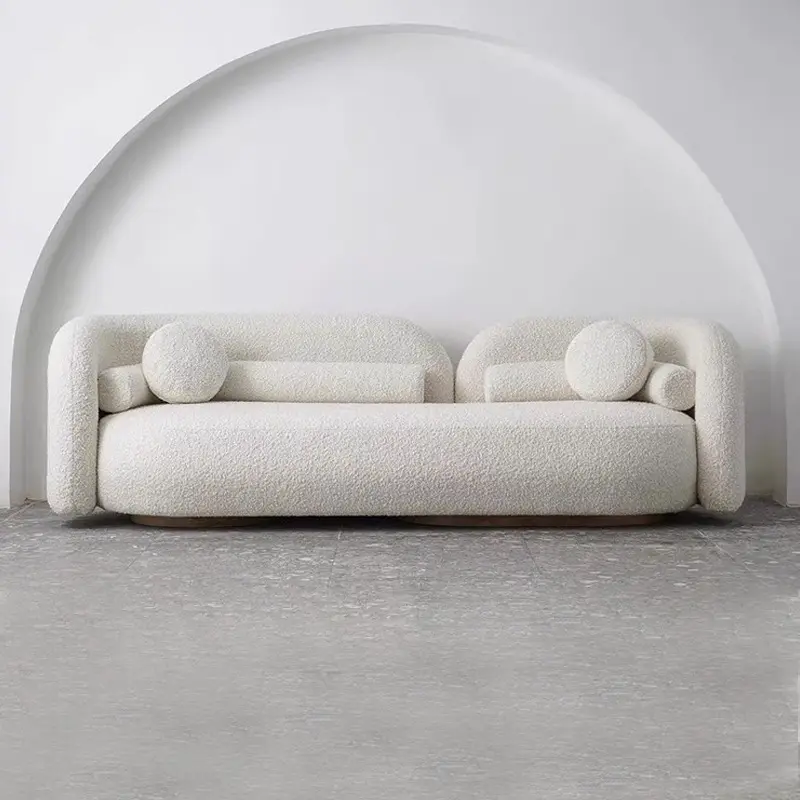 Sofá moderno curvo de tela bouclé con estructura de madera maciza - QY-S1283 1