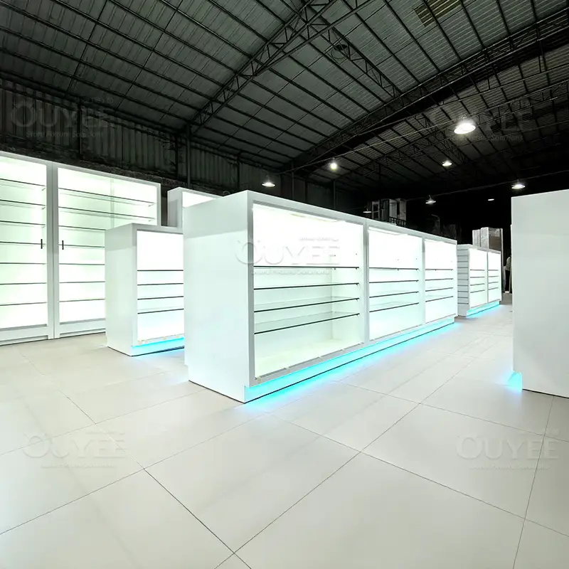 Modern White Smoke Shop Display Counters with LED Base Lighting for Dispensary Retail | Ouyee 1