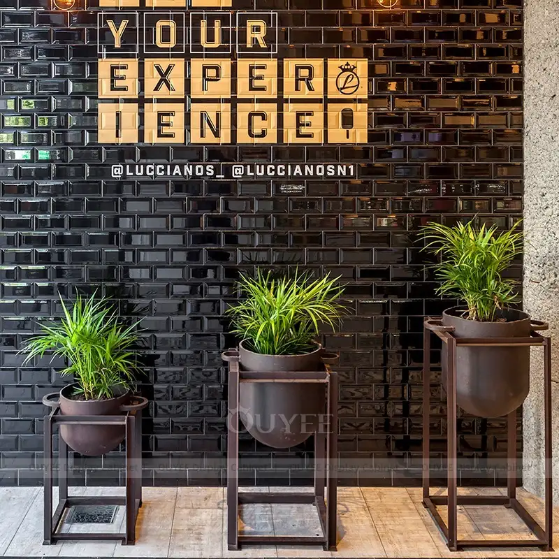 Modern Coffee Shop Interior with Custom Counter and Geometric Wall Design 1