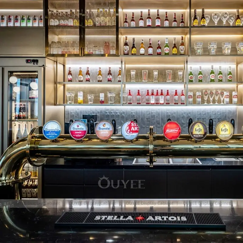Modern Coffee Bar Interior with Backlit Shelving and Lounge Seating 1