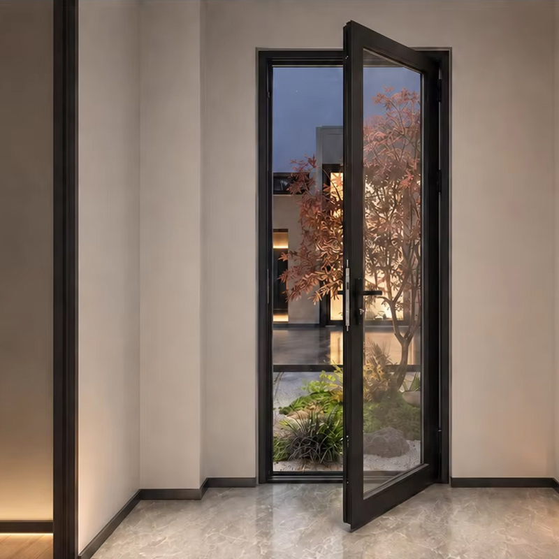 Puerta batiente de aluminio y vidrio con rotura de puente térmico 2
