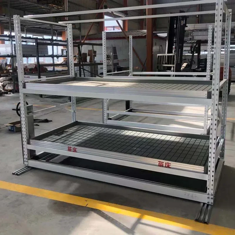 Invernadero de doble capa con sistema de flujo y reflujo, mesas de cultivo con ruedas 1