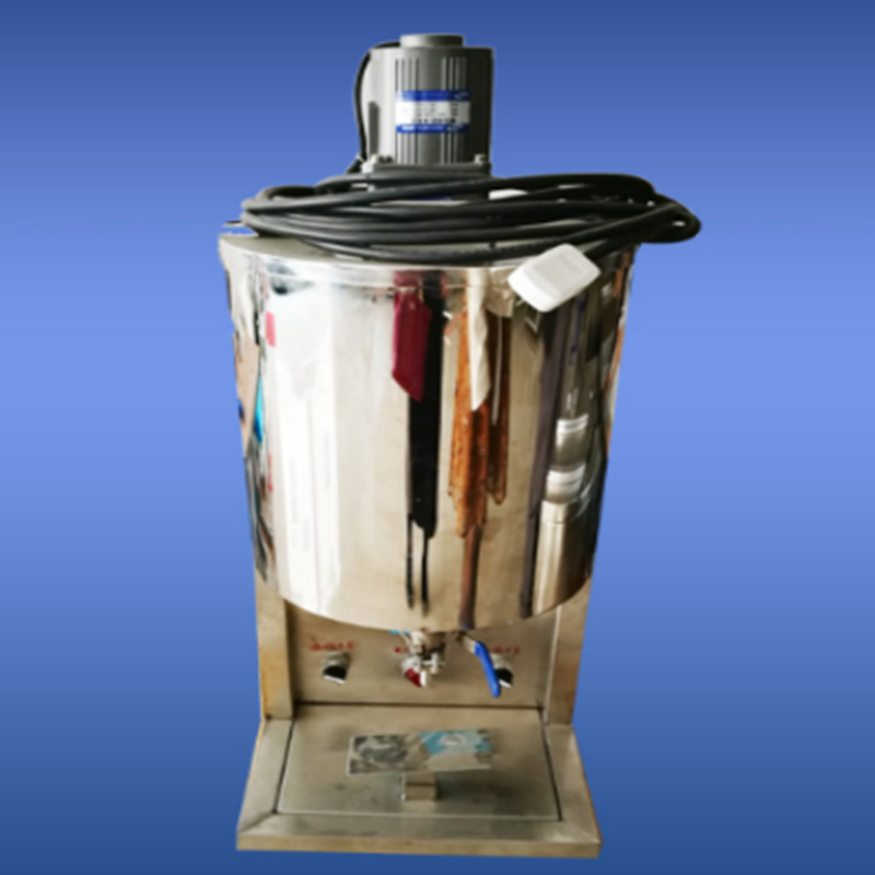 Front view of tabletop lip balm filling machine with mixing tank 1