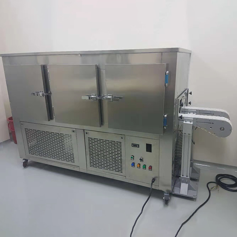 Industrial wax and lipstick cooling tunnel with automatic output mechanism