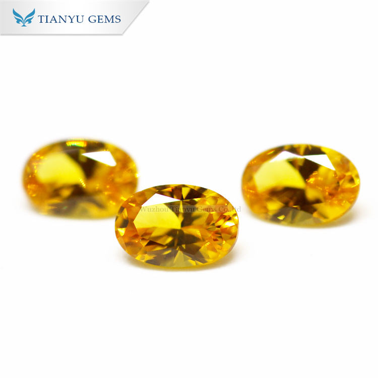 #144 Gemma sintetica nanosital ovale dorata taglio brillante 10