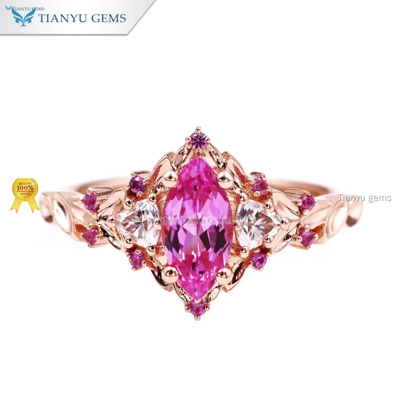 Marquise Pink Sapphire Ring in Rose Gold with Diamonds 1