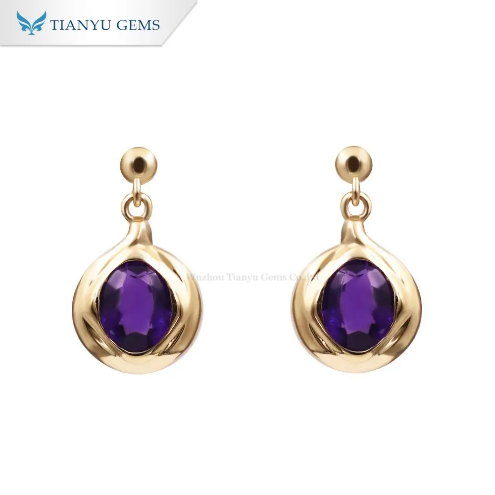 Boucles d'oreilles pendantes en or jaune 10 carats et saphir Ladenvert | Paillettes ovales violet royal 4 x 5 mm | Design sculptural en spirale 1