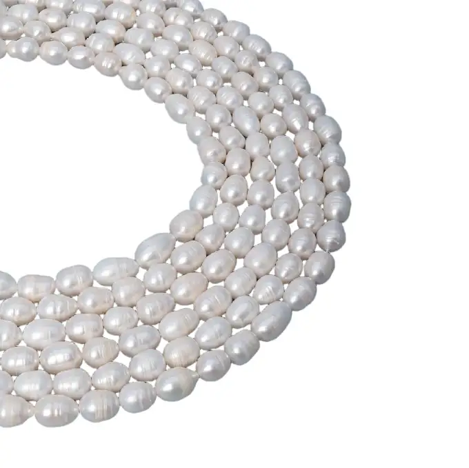 Hilos de perlas de arroz de agua dulce naturales AA de 9–10 mm, blancas, para la fabricación de joyas. 1