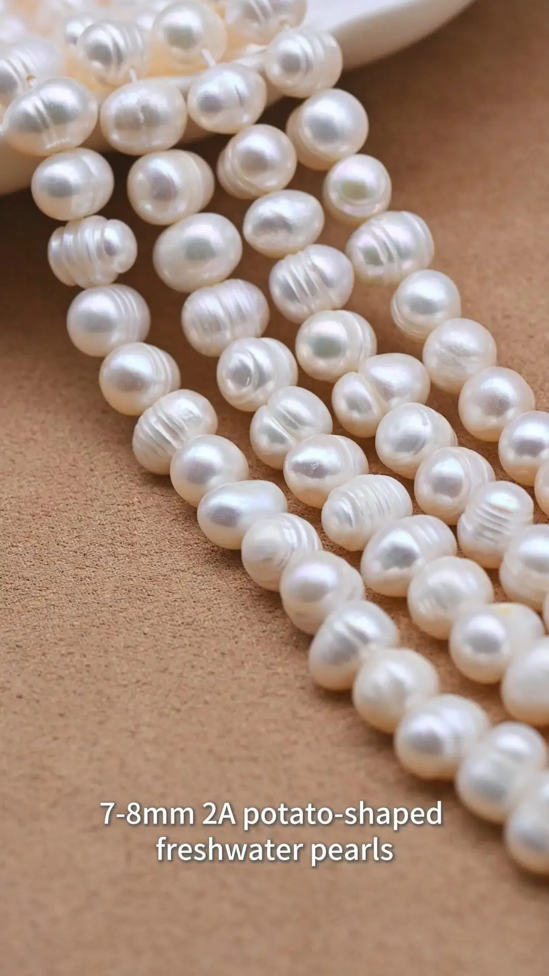 Hilo de perlas naturales de agua dulce blancas con forma de patata, de 7-8 mm (grado 2A), para la fabricación de joyas. 1