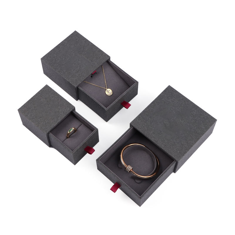Fabricantes al por mayor de cajas de embalaje para joyería clásicas personalizadas de color gris.